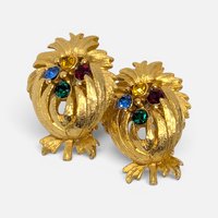Vintage textured gold tone botanical thistle clip on earrings set with ruby red, blue, green, and amber rhinestones