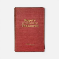 Vintage 1946 Roget's International Thesaurus hardcover in red cloth on a plain background.