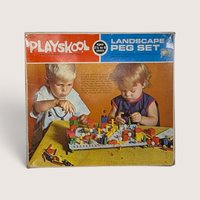 Vintage 1960s Playskool Landscape Peg Set box by Milton Bradley showing children playing with wooden blocks and pegs.