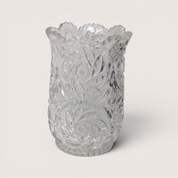 Stunning mid-century clear cut crystal vase with intricate starburst cut pattern and scalloped rim