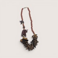 Vintage wooden statement necklace featuring carved wooden elephants and cascading wood chip beads
