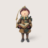 Vintage 1998 Lang and Wise Rejoice resin Christmas tree ornament singing with a book.