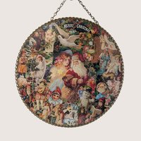 Vintage round Christmas wall hanging with Victorian-style collage art, metal chain, and decorative border.