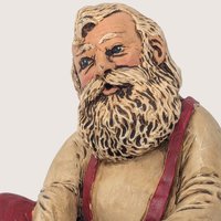 Vintage Santa Putting On Boots Resin Christmas Figurine