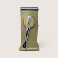 Vintage mid-century Rival Ice-O-Mat manual ice crusher in avocado green with chrome handle.