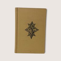 Vintage 1940 hardcover book New Ritual of the Order of the Eastern Star with emblem on cover.