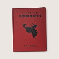 Vintage 1936 hardcover book titled The Book of Cowboys by Holling C. Holling with red cover and cowboy illustration.