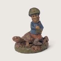 A vintage 1994 Tom Clark resin gnome figurine titled No Passing Zone riding a turtle against a neutral background.