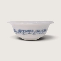 Vintage Glasbake white milk glass round casserole serving dish featuring a blue Currier and Ives winter landscape on white backdrop.   
