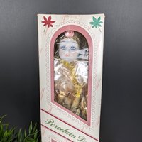 Vintage Porcelain Doll in Gold