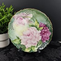 Reticulated Plate with Pink Roses on a Green Background