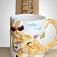 Takahashi Dinosaur Mug, Guitar Playing Dinosaur,  Novelty Mug,  Collectible Mug,  Unique Gift for Music Lovers