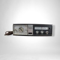 Vintage Lloyds Solid State Clock Radio
