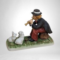 Whimsical Harmony: 1993 Melody in Motion 'Charmed Bunnies' Figurine