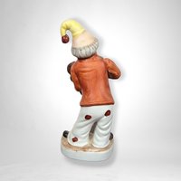 Whimsical Nostalgia: Vintage Ceramic Violin Clown Figurine