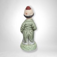 Vintage Ceramic Hobo Clown Figurine with Bat: Whimsical Collectible