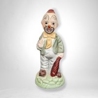 Vintage Ceramic Hobo Clown Figurine with Bat: Whimsical Collectible