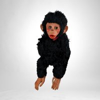 Charming Toy: Vintage Rubber Face Monkey Doll with a Touch of Creepy Nostalgia