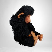 Charming Toy: Vintage Rubber Face Monkey Doll with a Touch of Creepy Nostalgia