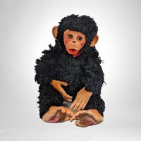 Charming Toy: Vintage Rubber Face Monkey Doll with a Touch of Creepy Nostalgia