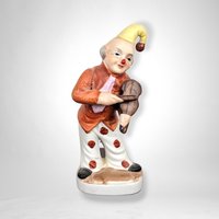 Whimsical Nostalgia: Vintage Ceramic Violin Clown Figurine