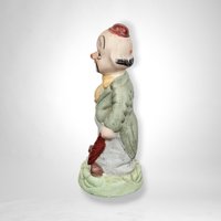 Vintage Ceramic Hobo Clown Figurine with Bat: Whimsical Collectible
