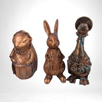 Vintage Resin Beatrix Potter Figurines | Benjamin Bunny, Mrs. Tiggy Winkle, Jemima Puddle Duck, Peter Rabbit | Metal-Colored Collectible Set