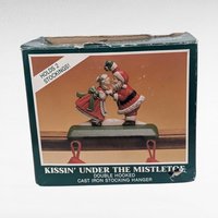 Vintage Midwest Cannon Falls Cast Iron Kissing Santa Mrs Claus Double Stocking Holder, Mistletoe Christmas Mantle Hanger Pair