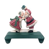 Vintage Kissing Santa Stocking Holder: Cast Iron Christmas Mantle Hanger