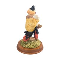 Vintage Waving Clown Figurine: Bicycle Rider