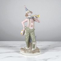 Vintage Porcelain Clown with Horn and Tambourine