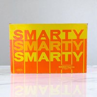 Rectangular vintage game box with a vibrant yellow and orange color scheme. The word SMARTY is repeated three times in a bold, stacked sans-serif font. The texture appears to be matte cardboard with minor edge wear.