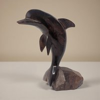 1970s Hand Carved Desert Ironwood Dolphin Sculpture on Natural Base