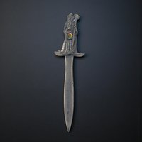 A tall pewter letter opener featuring a multi-towered medieval castle handle topped with a robed wizard figure. The pewter has a dark, antiqued patina that highlights the stonework of the fortress and the flowing robes of the sorcerer.