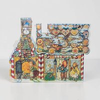 A colorful cardstock advent calendar shaped like a charming two-story cottage. The illustration features a snowy roof, festive wreaths on the windows, and a vibrant red door. The silhouette is die-cut following the peaked roofline and chimney.