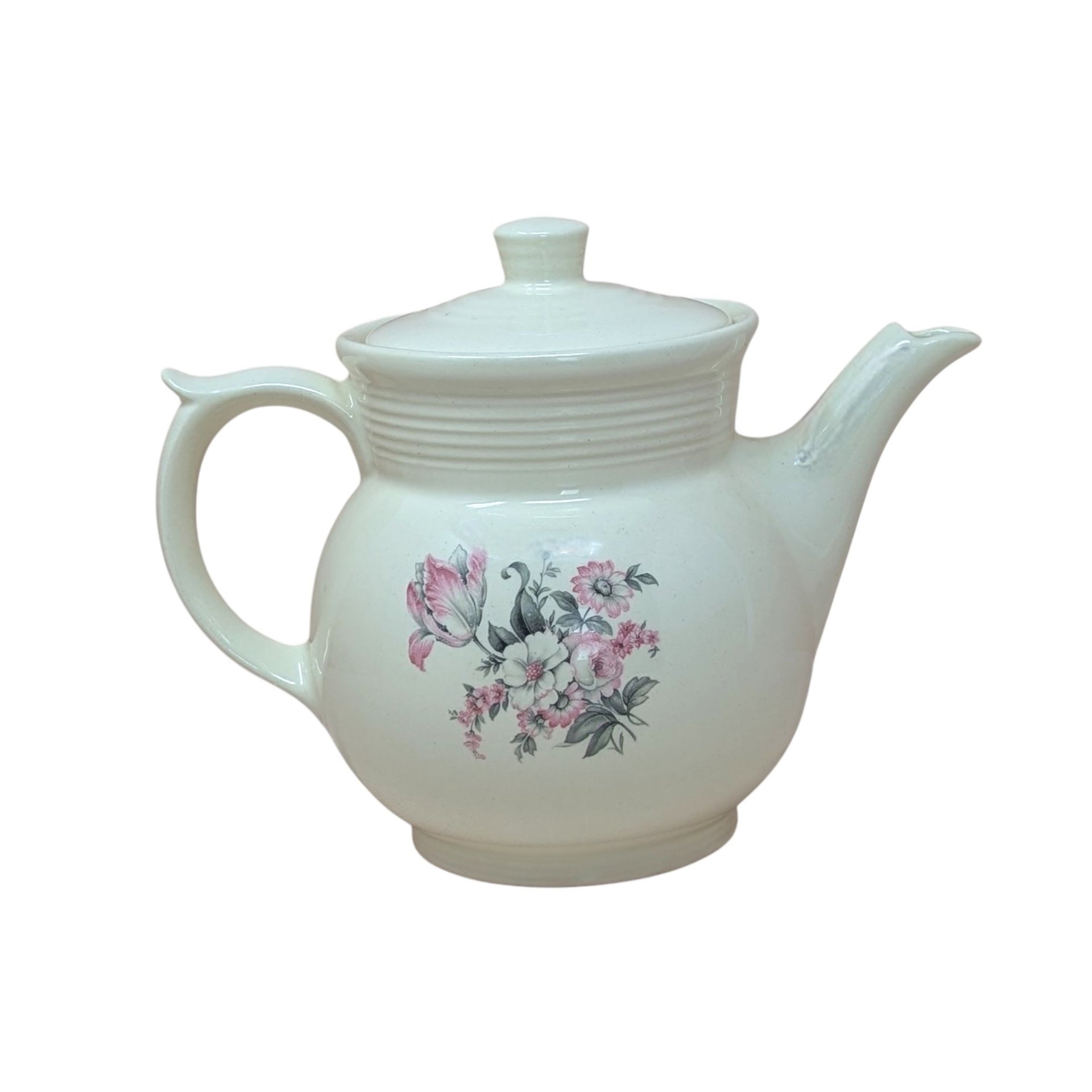 Vintage cream ceramic Drip-O-Lator coffee pot and lid. Features a central floral spray of pink tulips and white daisies. Sculptural scroll-top handle and tiered "stepping" on the neck. 7.25 inches tall.