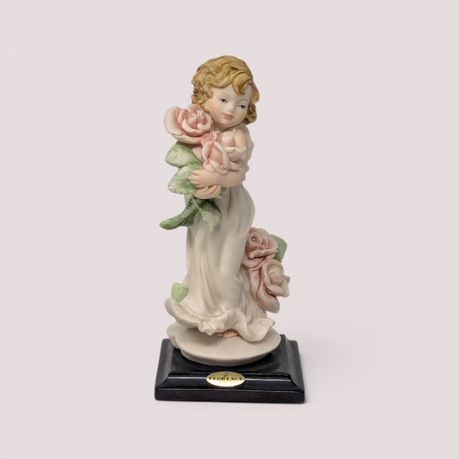 Vintage 1999 Giuseppe Armani Florence Rosette Mother's Day porcelain figurine holding roses.