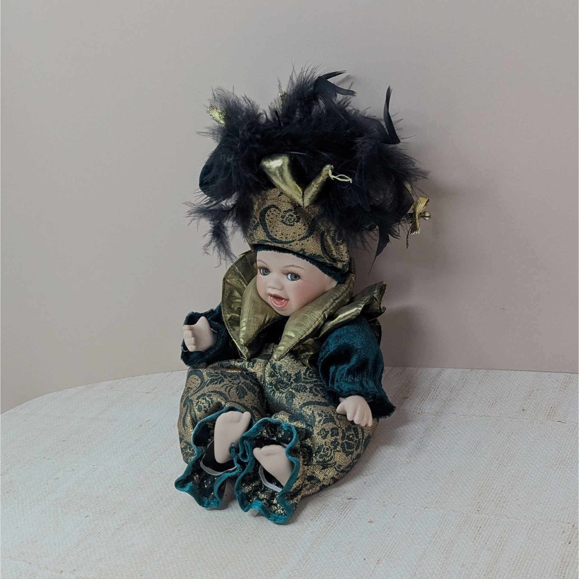 Vintage Porcelain Mardi Gras Jester – 12" Emerald & Gold Posable Baby Doll