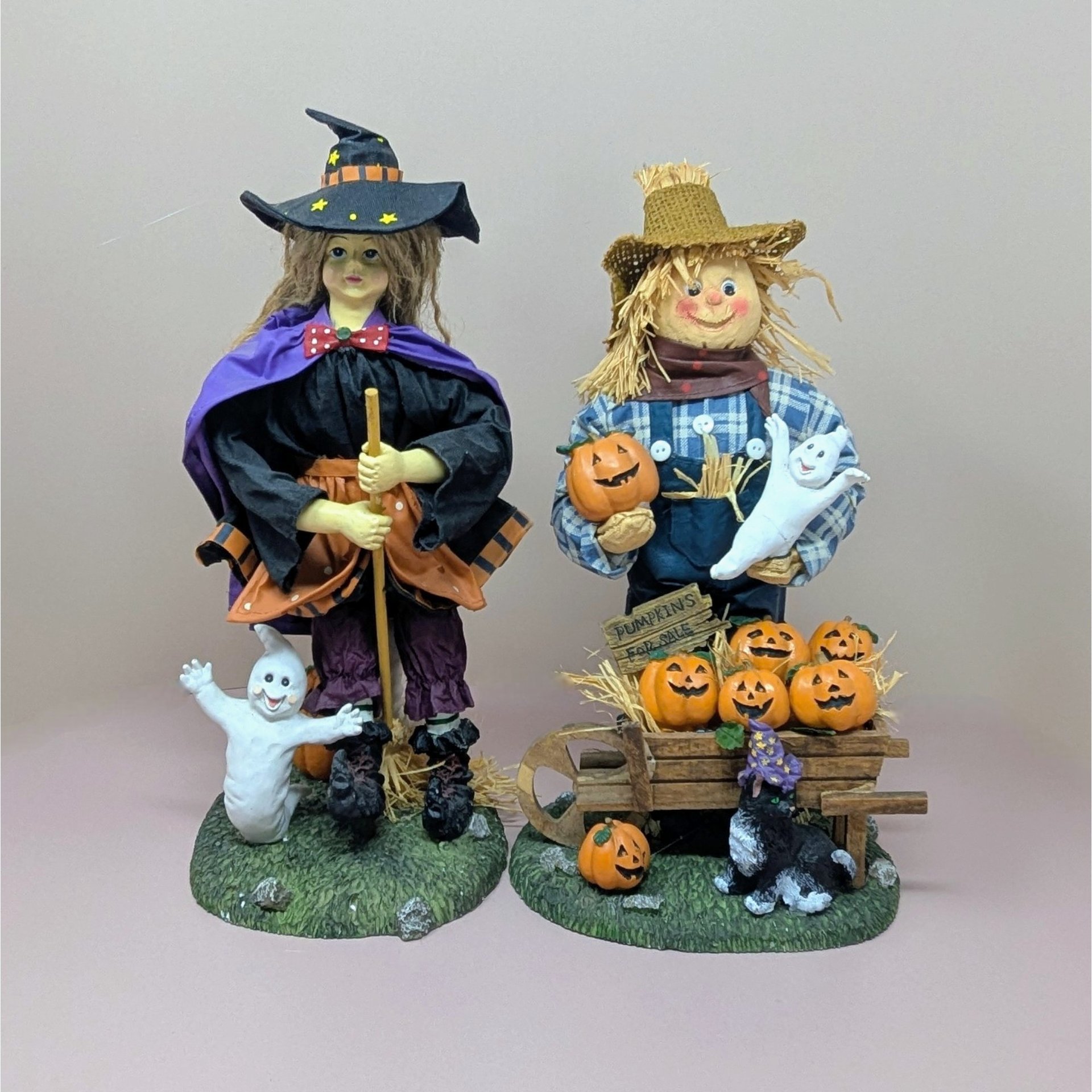 a photo of a fabric mache witch and scarecrow set with the text Scarecrow and Witch 13 inch Fabric Mache Figurines against a neutral background.