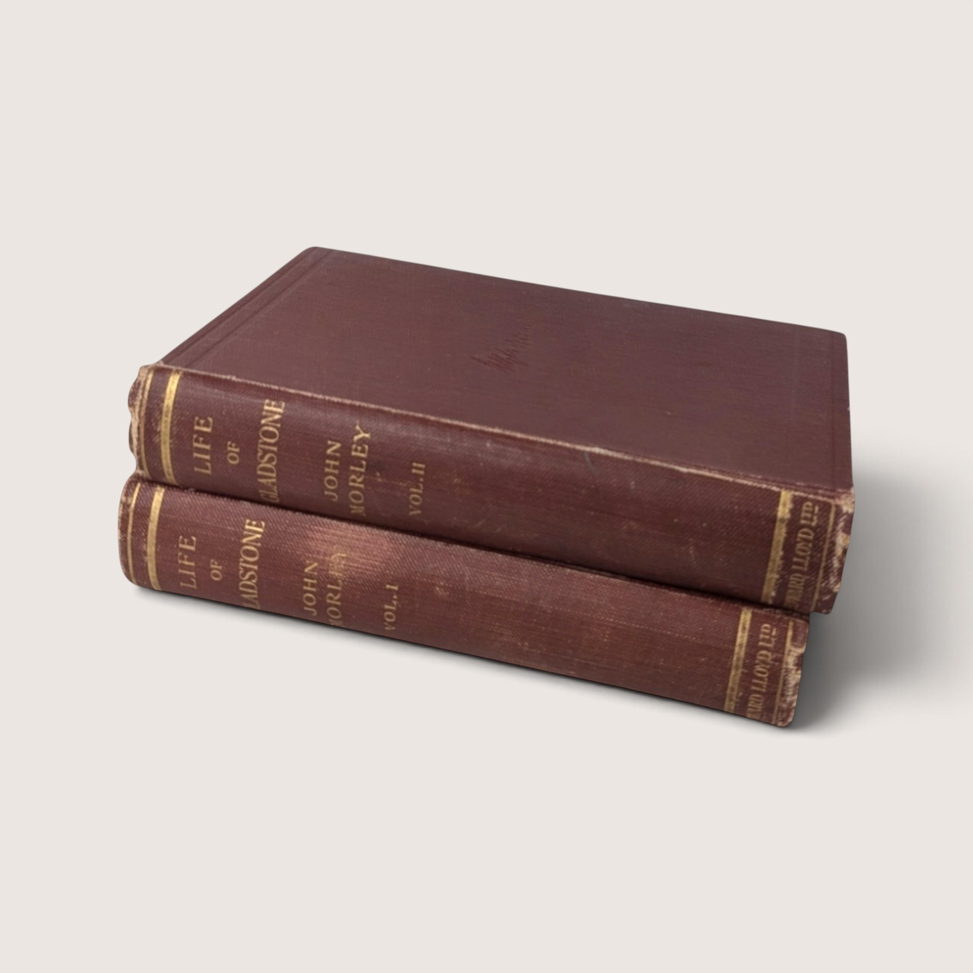 1908 antique 2-volume Life of Gladstone biography set by John Morley featuring red cloth bindings and gold lettering.