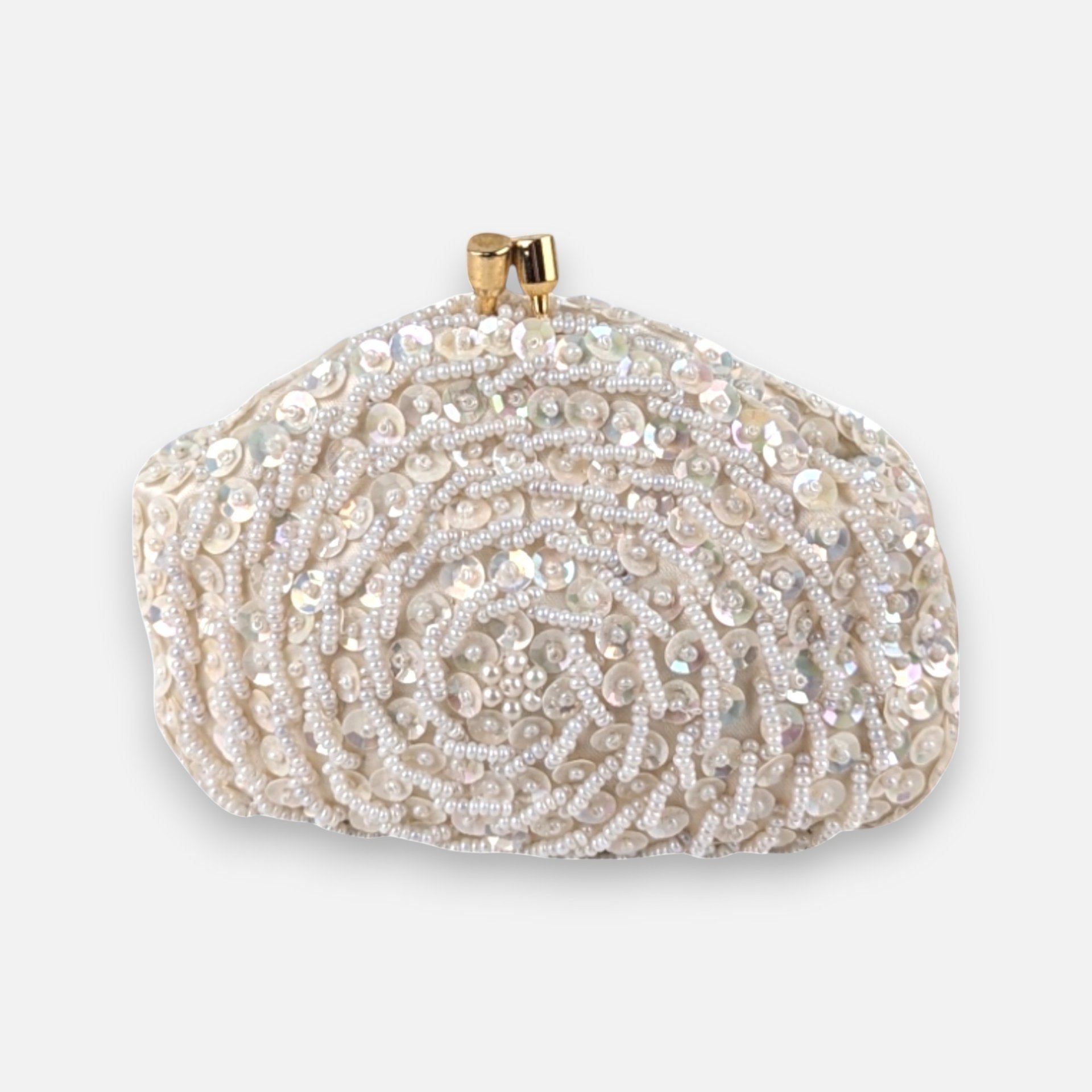 Cream satin kiss-lock coin purse heavily embellished with a swirling pattern of white seed beads and iridescent sequins.