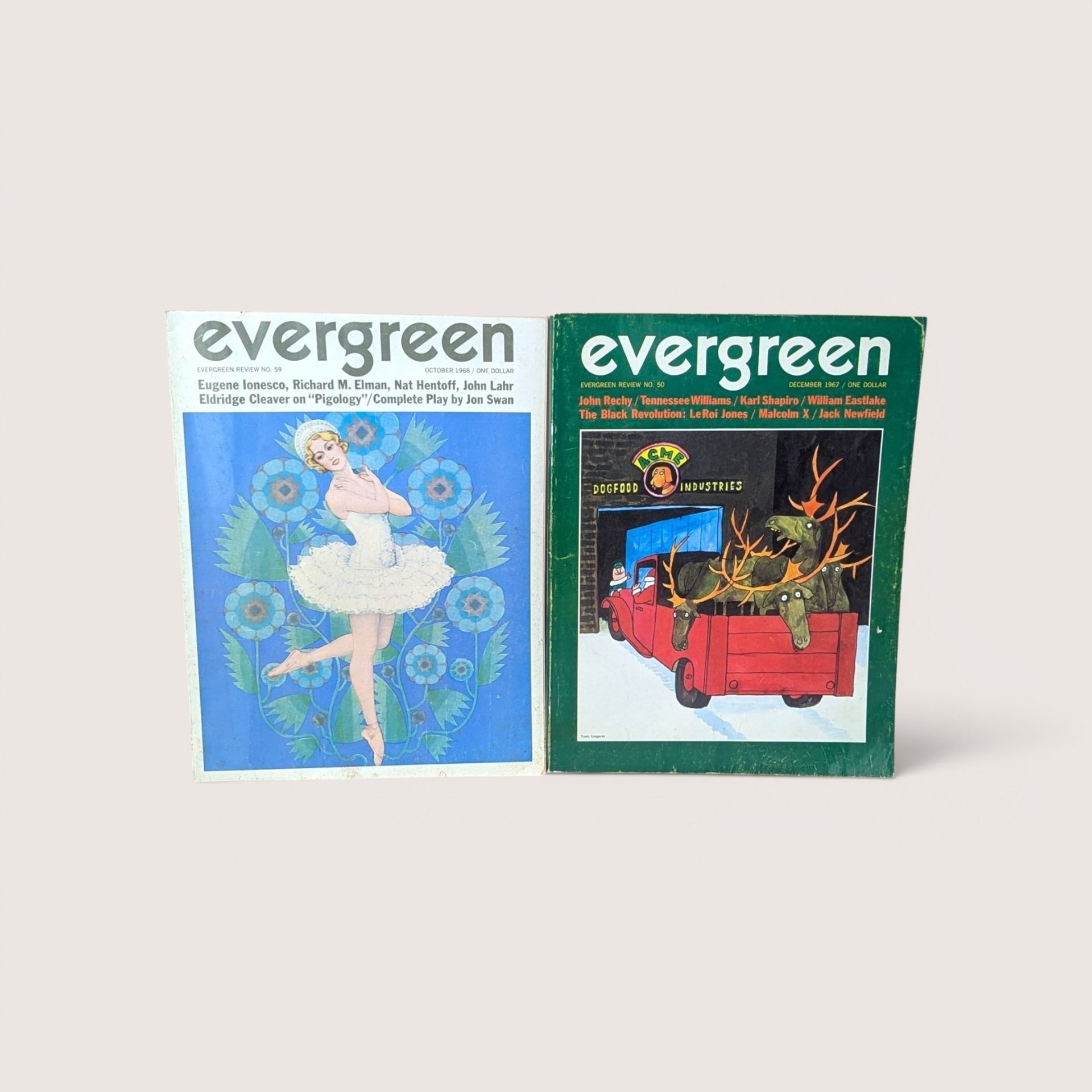 Two vintage Evergreen Review magazine covers side by side featuring illustrated artwork, centered on a beige background.