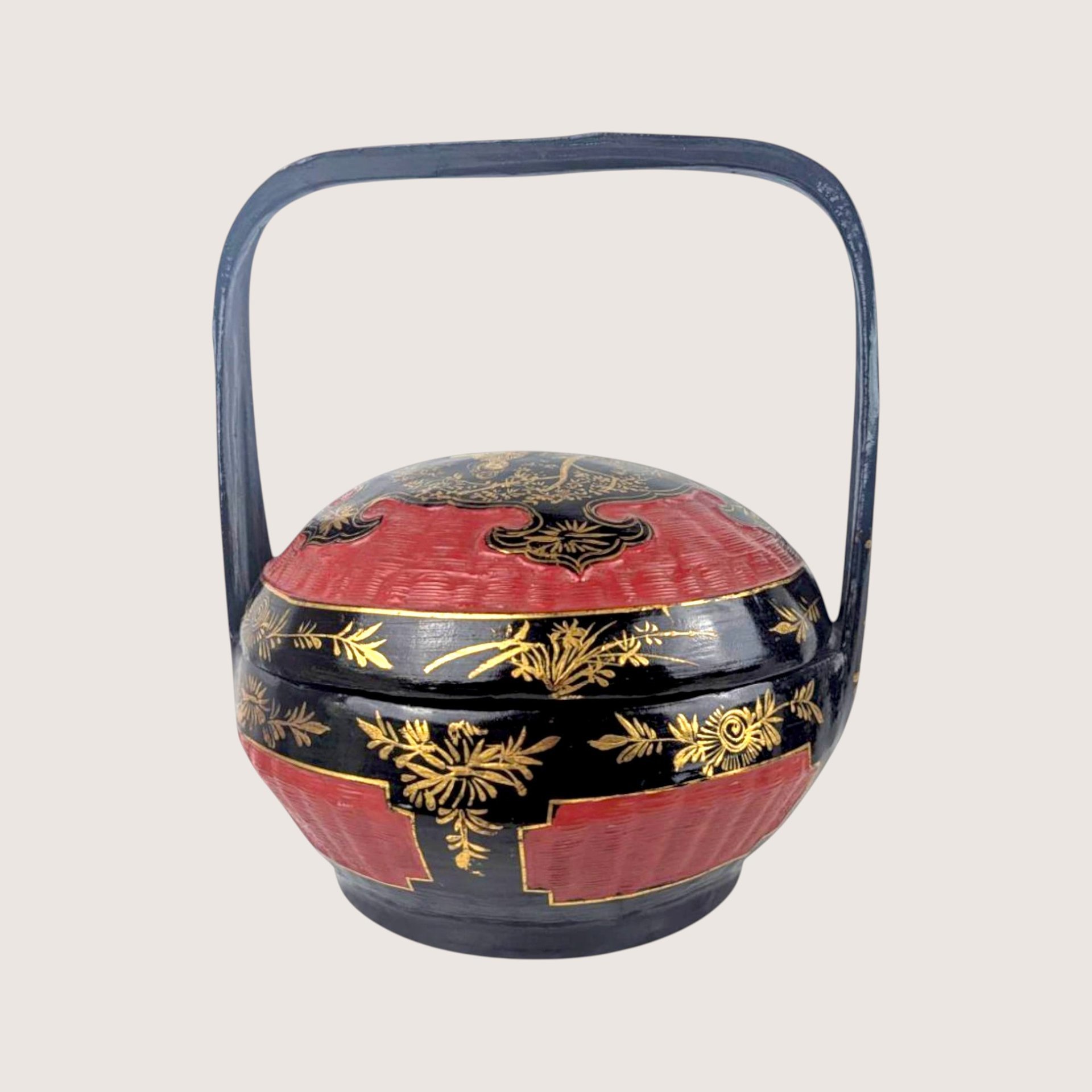 A vintage Chinese hand painted bamboo wedding basket with a black and red lacquer finish.