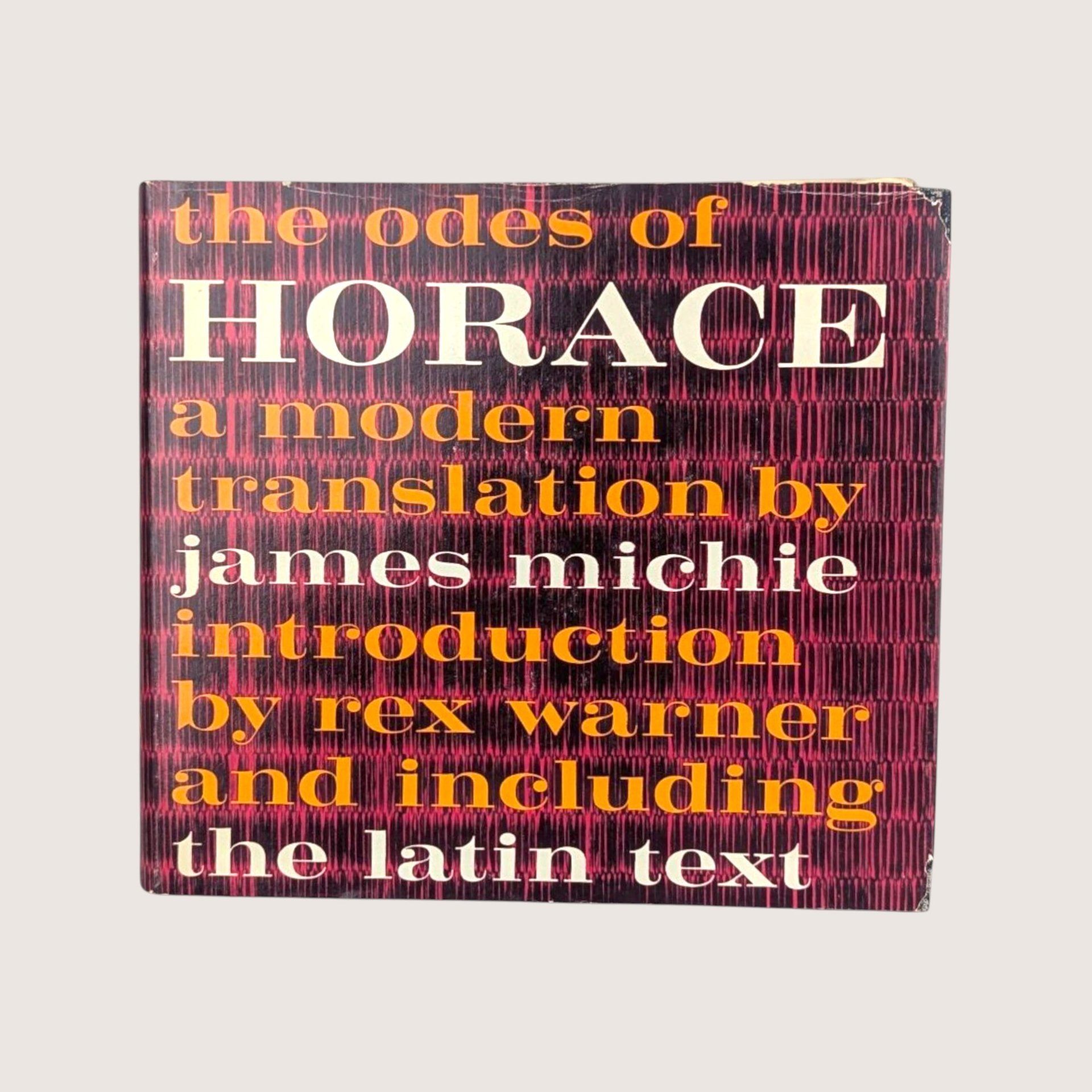 A vintage 1963 hardcover edition of The Odes of Horace with a black and magenta textured dust jacket.