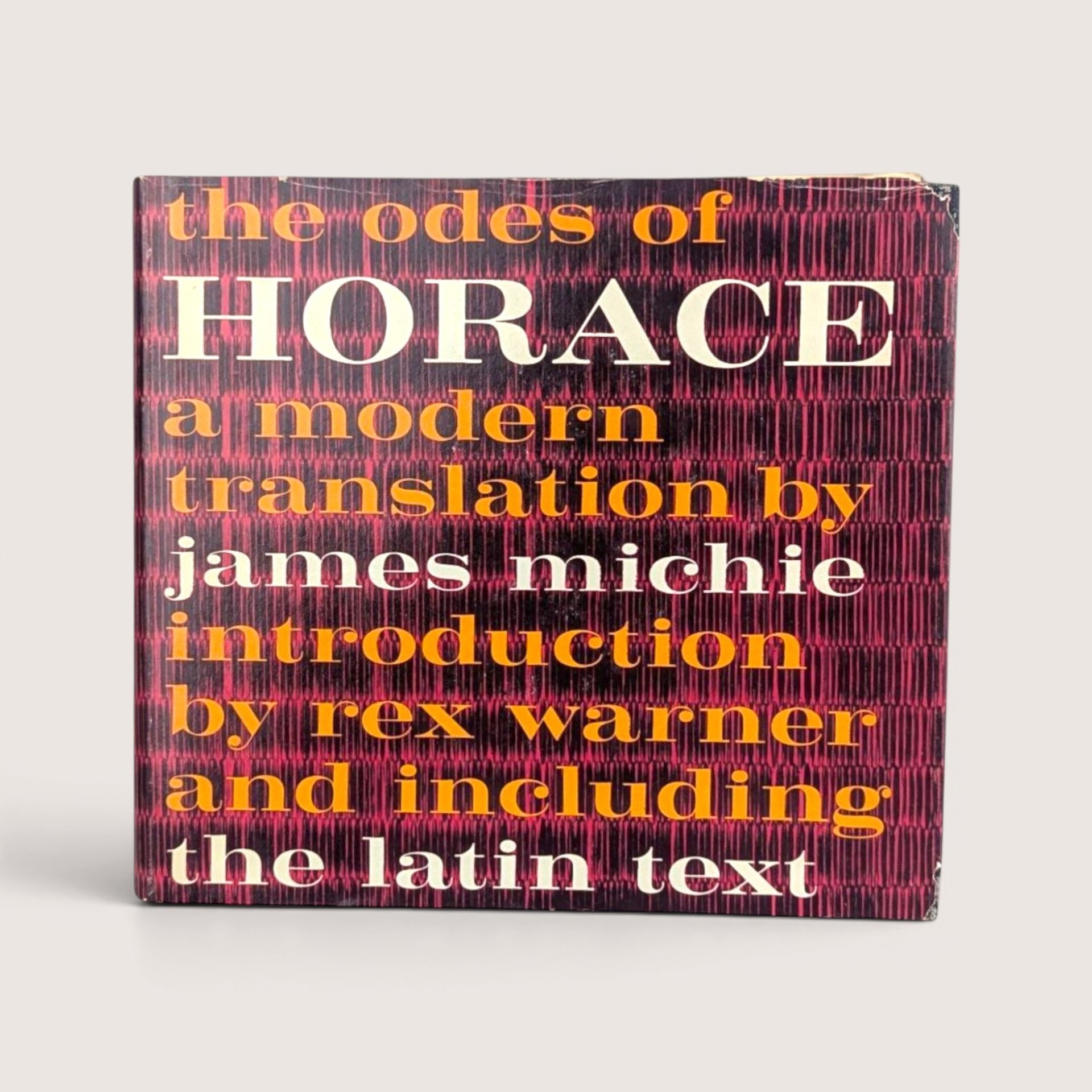A vintage 1963 hardcover edition of The Odes of Horace with a black and magenta textured dust jacket.