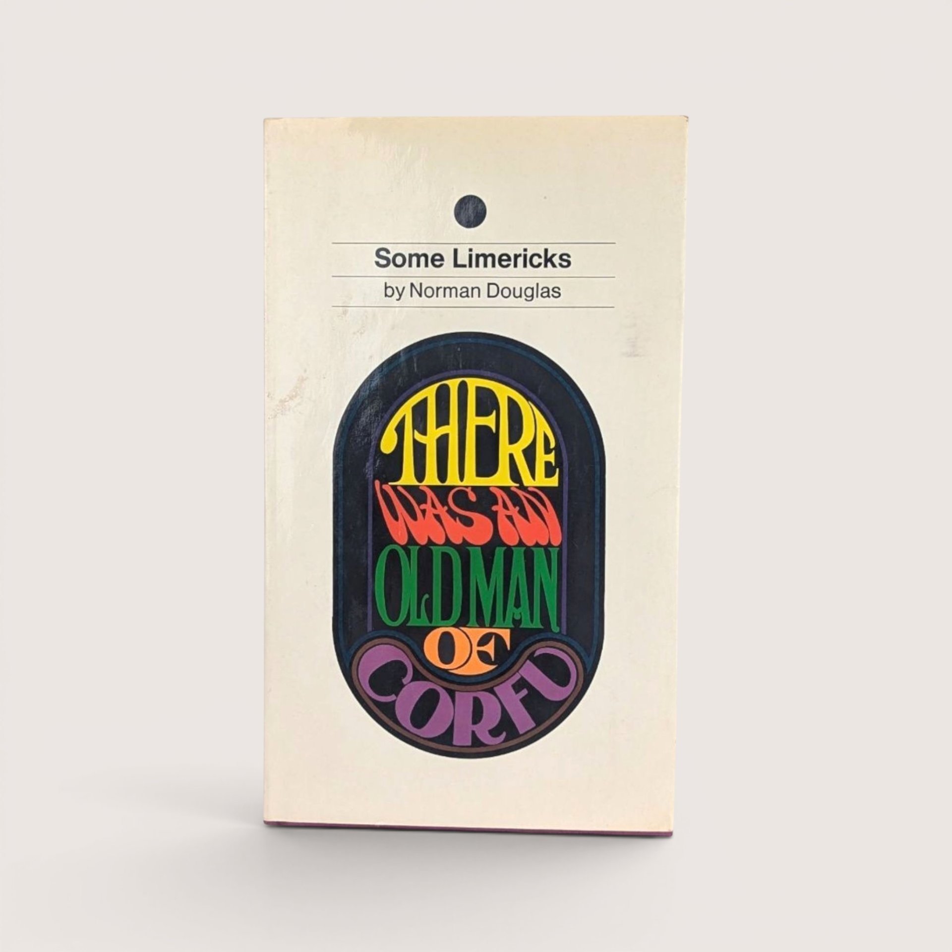 A vintage 1967 hardcover edition of Some Limericks by Norman Douglas with a colorful psychedelic typography dust jacket.