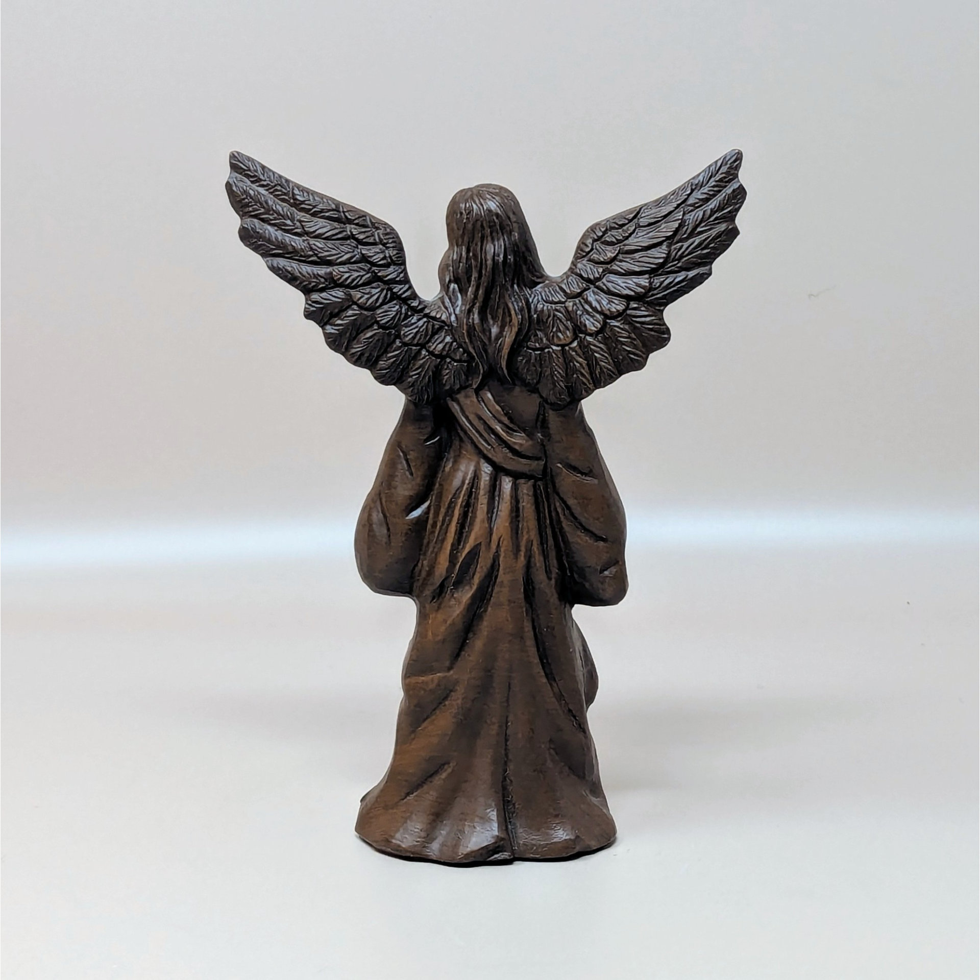 A vintage limited edition "Christina" angel figurine by Lori Johnson. The detailed resin figure has a bronze-like finish, stands approximately 6.25 inches tall, and is shown against a neutral background.