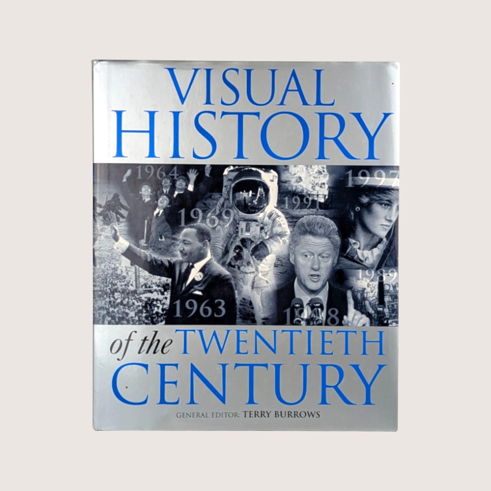 The dust jacket cover of Visual History of the Twentieth Century hardcover book edited by Terry Burrows.