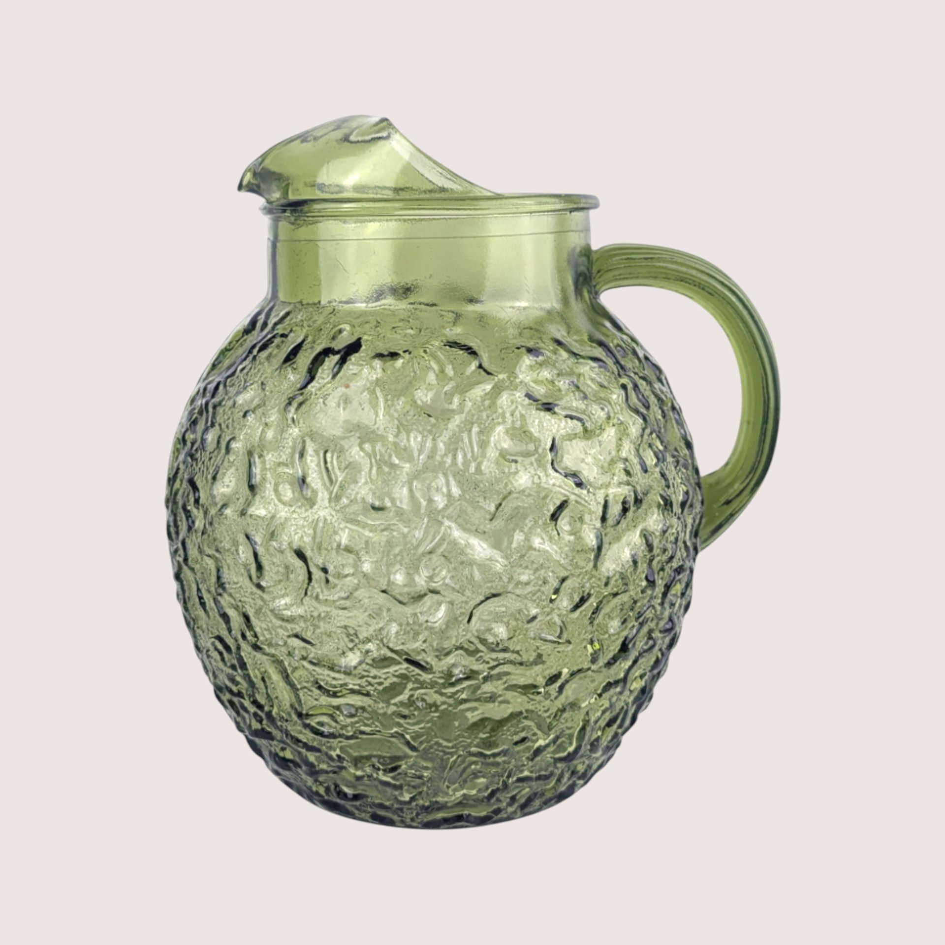 Vintage Anchor Hocking green crinkled glass ball pitcher with an integrated ice lip, shown on a neutral background.