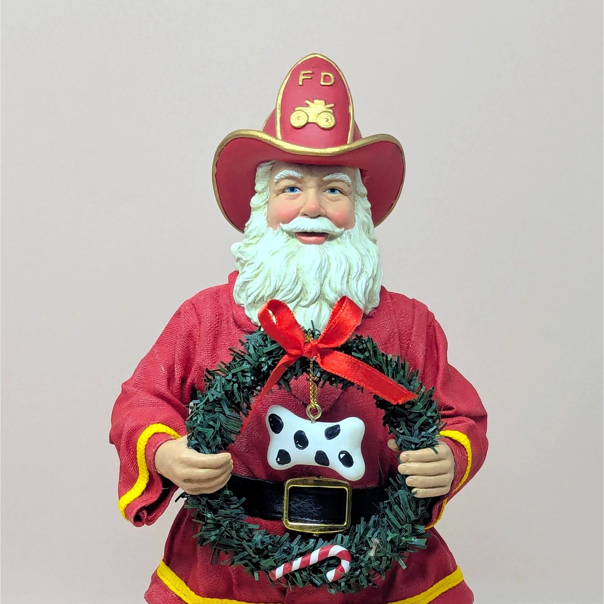 1990s Fabriche Fireman Santa Holding Wreath Figurine